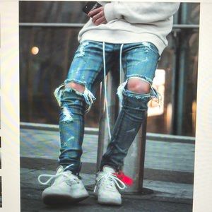 distressed track denim jeans